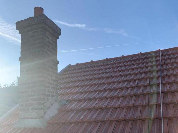 Démoussage toiture Tournan-en-Brie